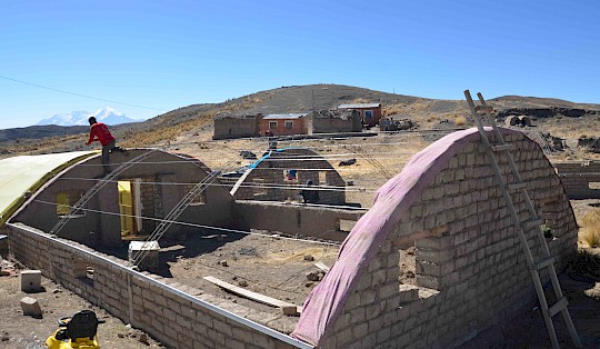 The construction of greenhouses is a sustainable way to support agriculture in the otherwise dry land.