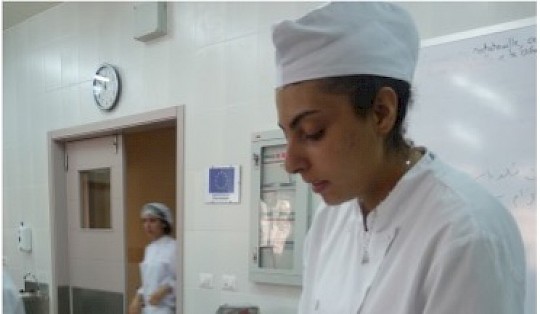 Preparing “Ma’moul” pastries in the culinary workshop of IMS.